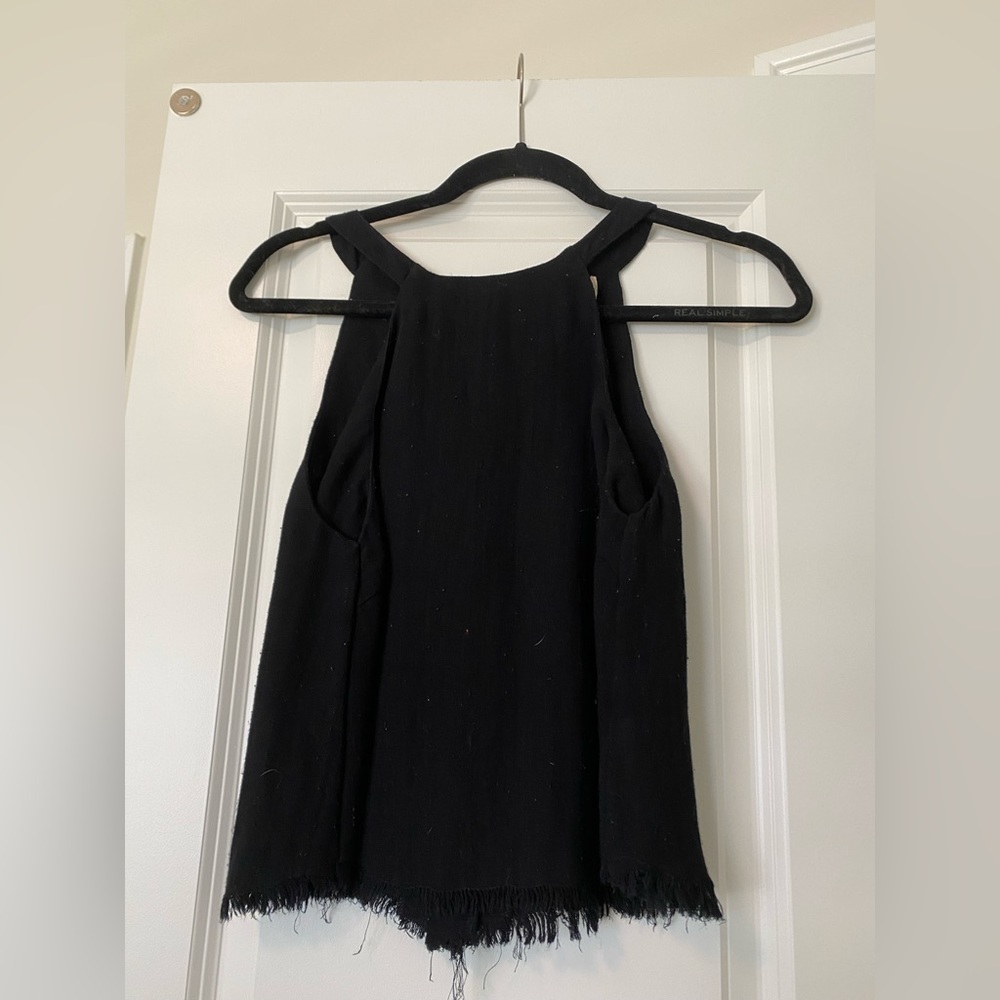 Small, black altard state top